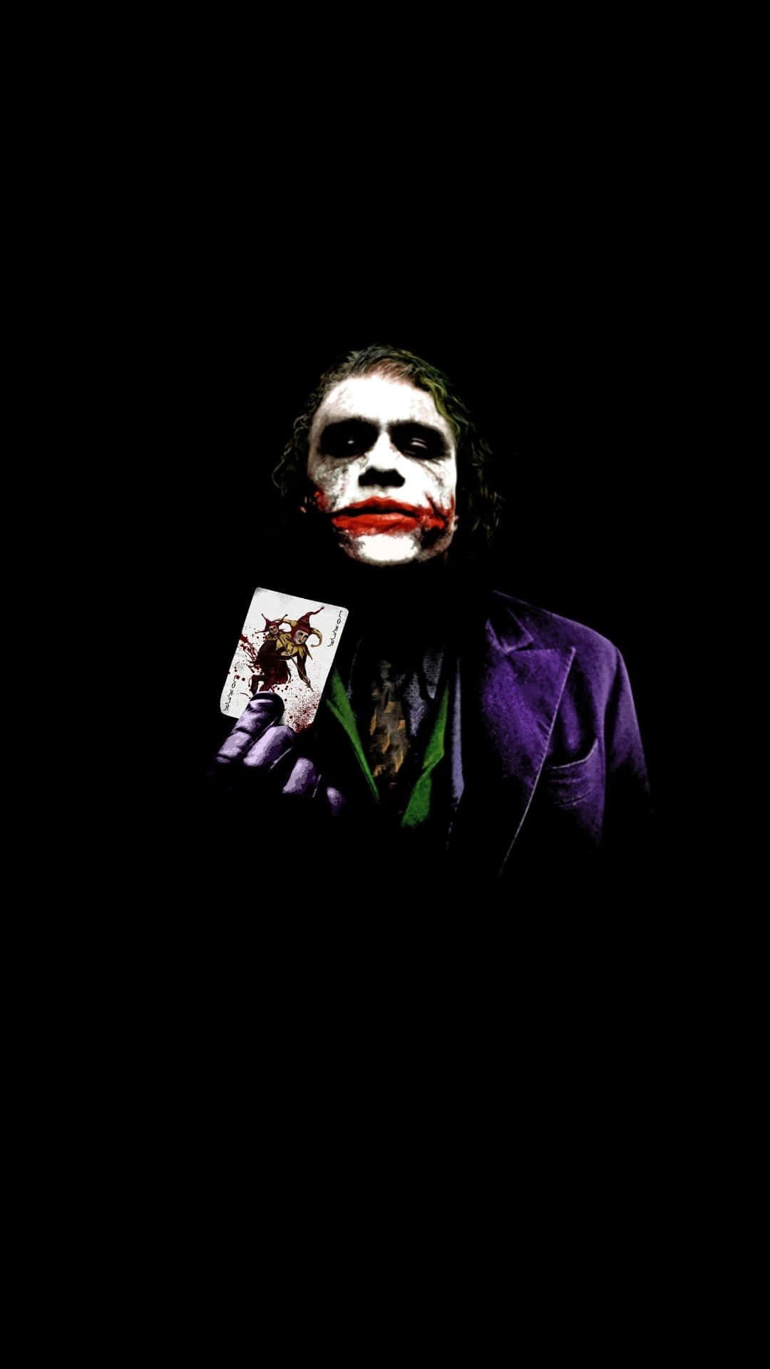 Sinister Joker Art in Vibrant Hues Wallpaper
