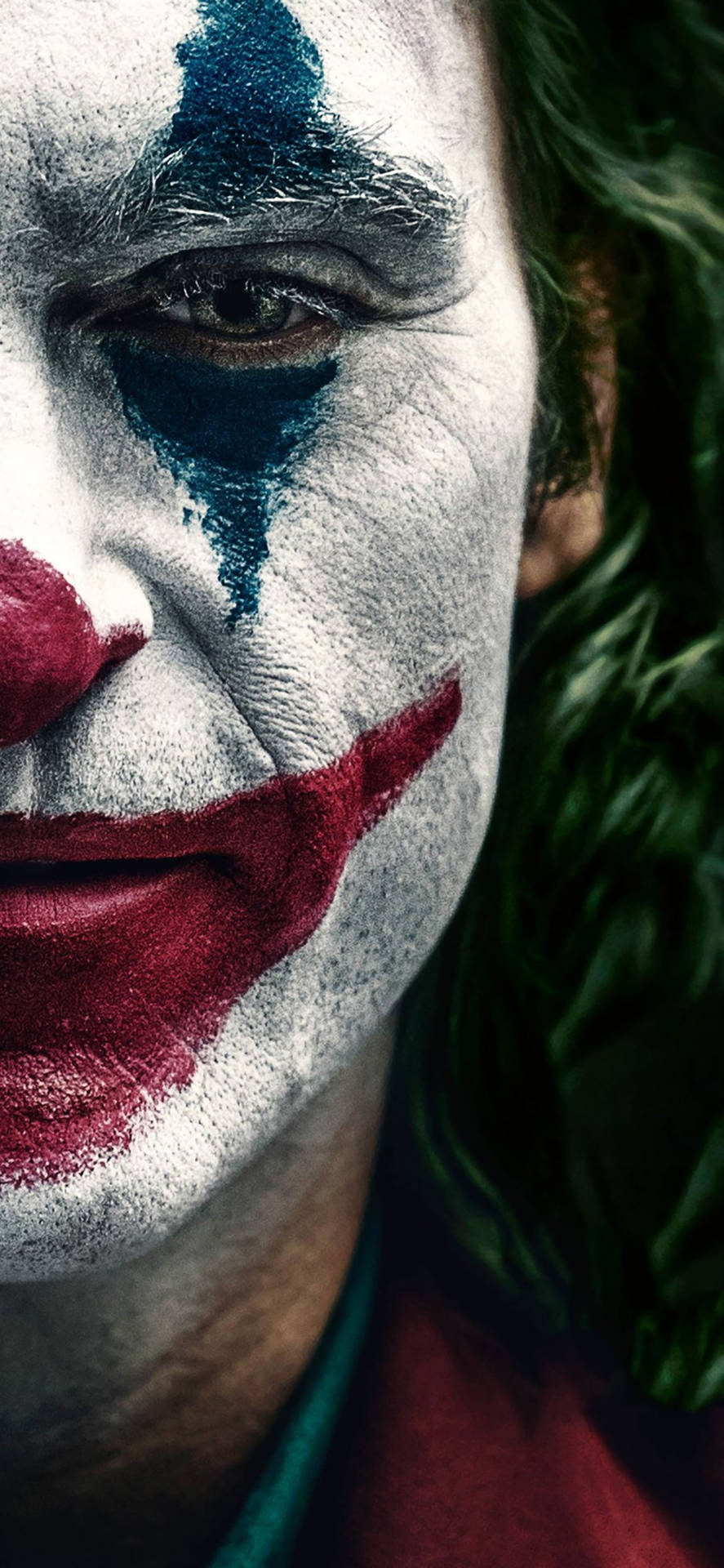 Joker iPhone Half Face Wallpaper