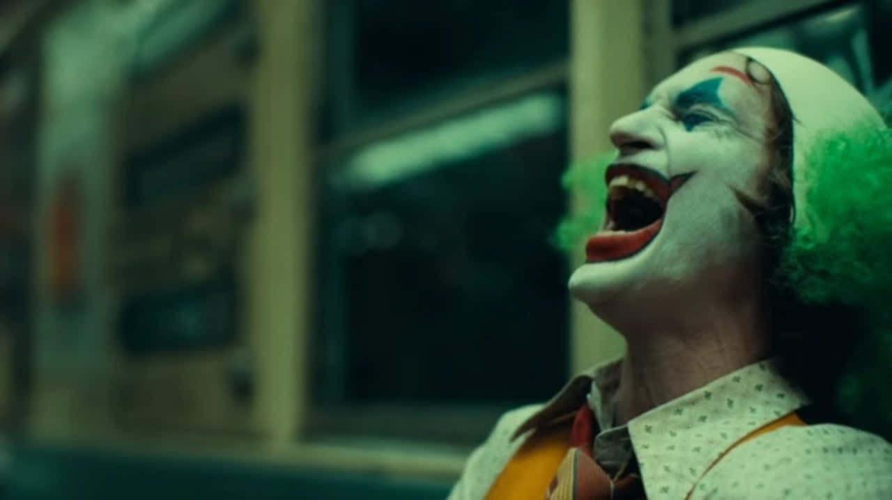 Joker Laughing in the Dark Wallpaper