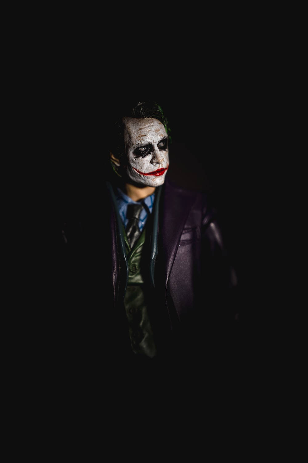 Download Joker Phone In The Shadows Wallpaper | Wallpapers.com