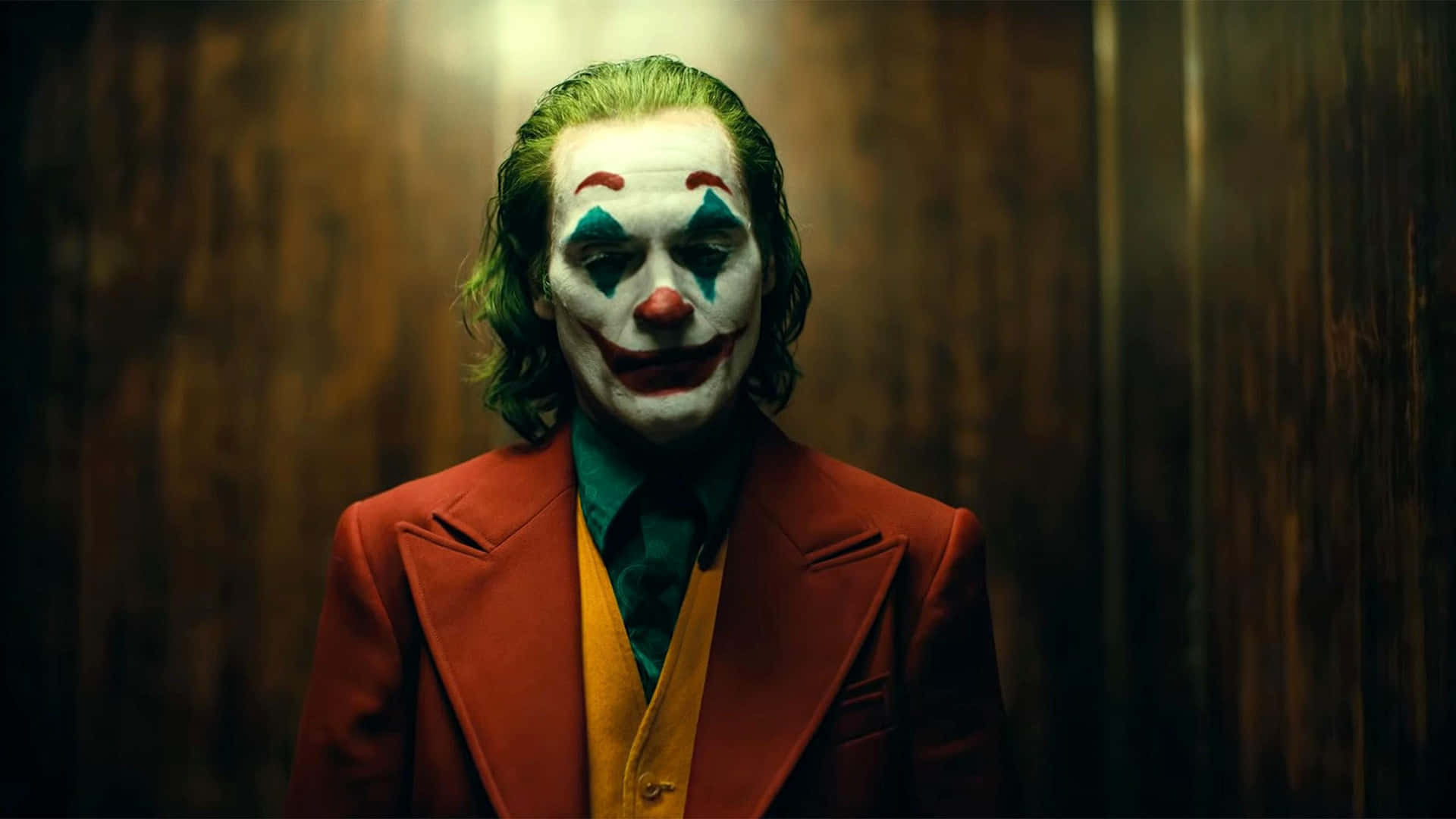 Joaquin Phoenix as the iconic Joker. Wallpaper