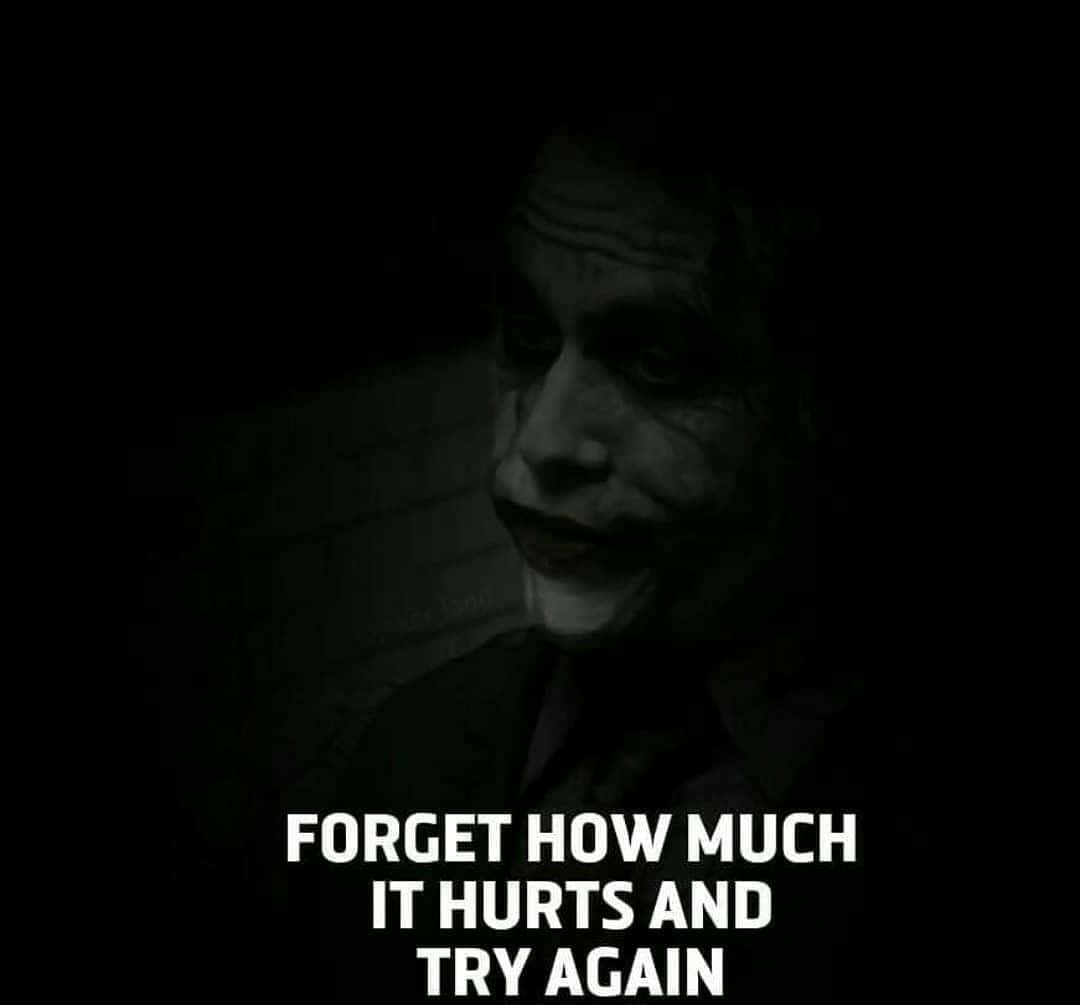 Thought-provoking Joker Quote on Dark Background Wallpaper