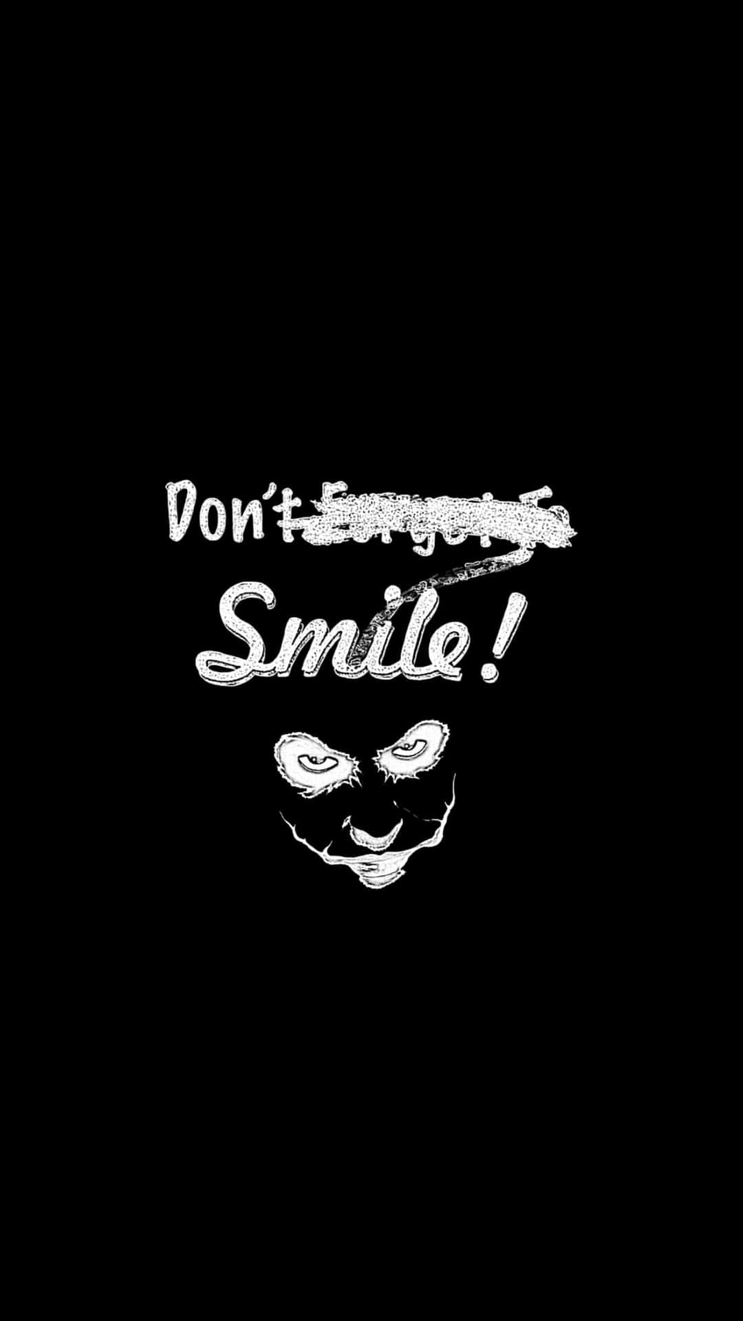 Thought-provoking Joker Quote on a Dark Background Wallpaper