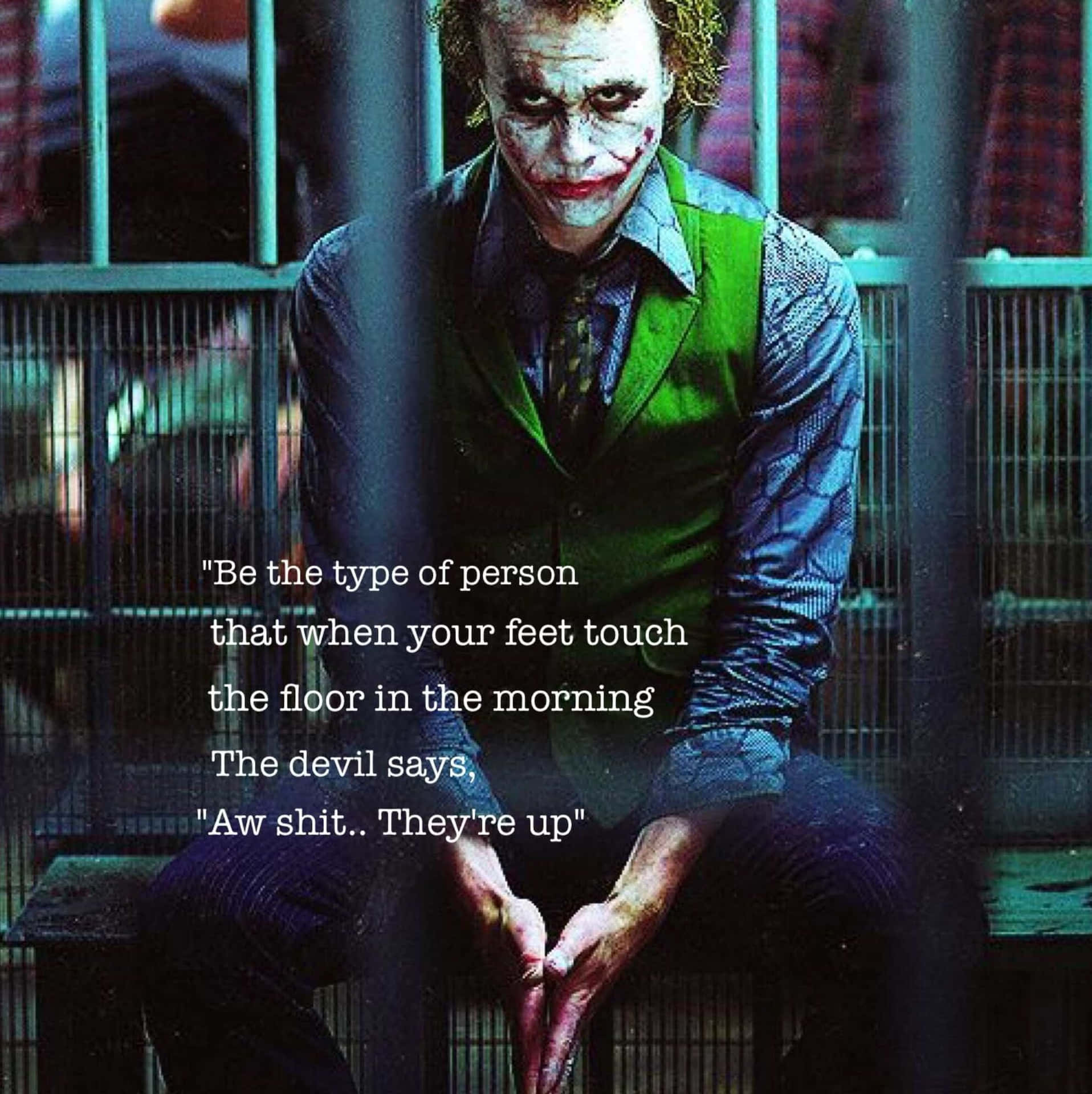 The Joker's smile with quotes Wallpaper
