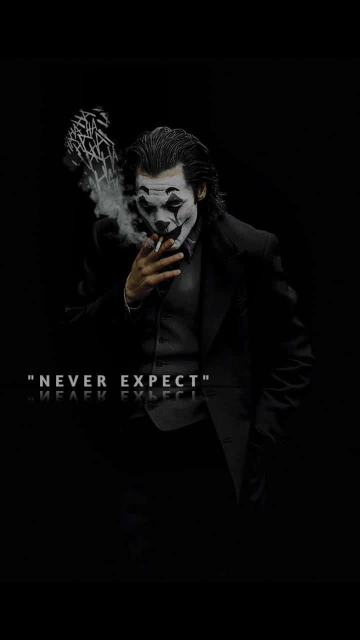 "Intriguing Joker Quote on a Dark, Artistic Background" Wallpaper