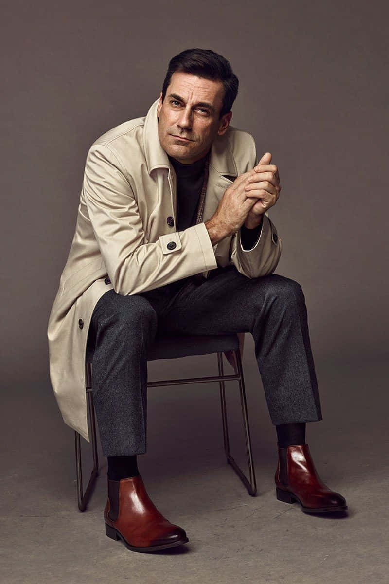 Award-winning actor Jon Hamm in a casual yet sophisticated attire Wallpaper