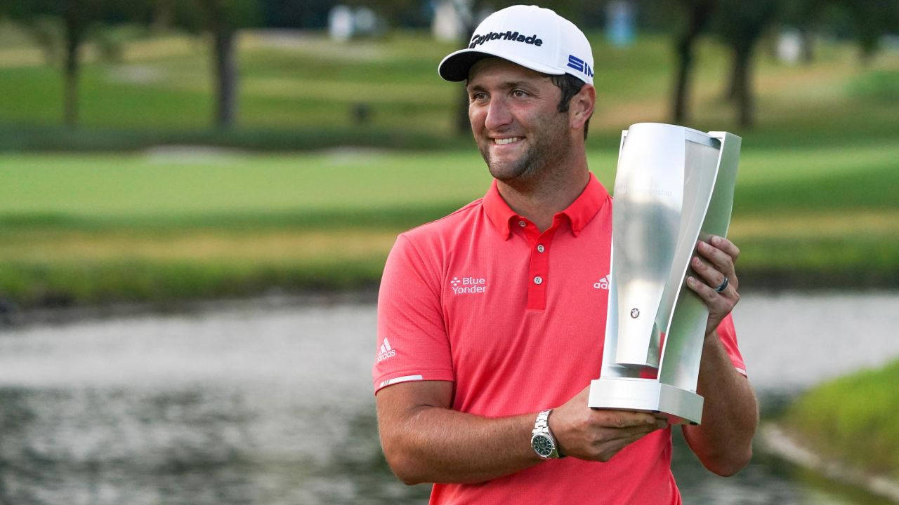 Jon Rahm With His Silber Trophy Wallpaper