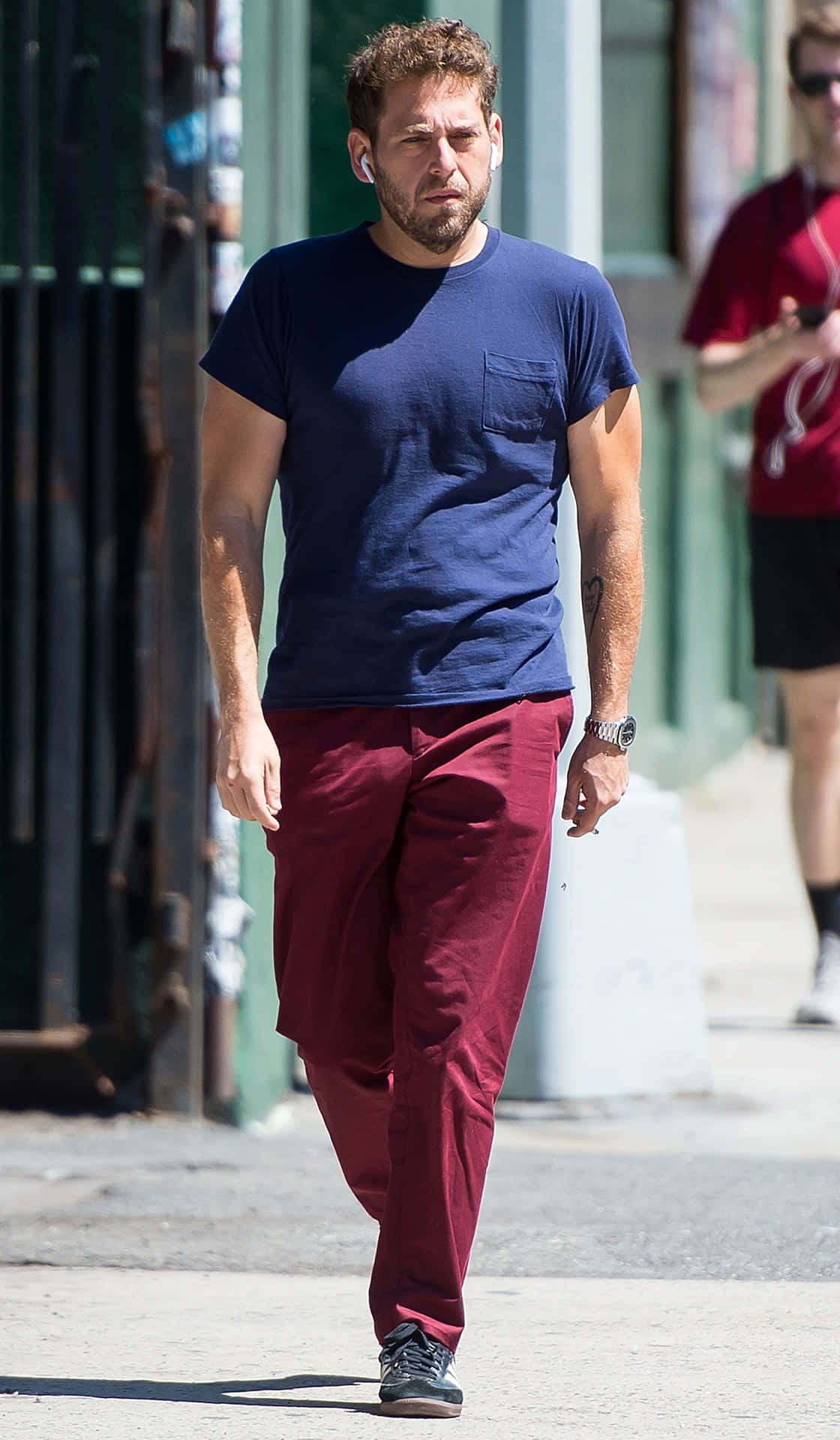 Actor Jonah Hill smiles while out on location. Wallpaper