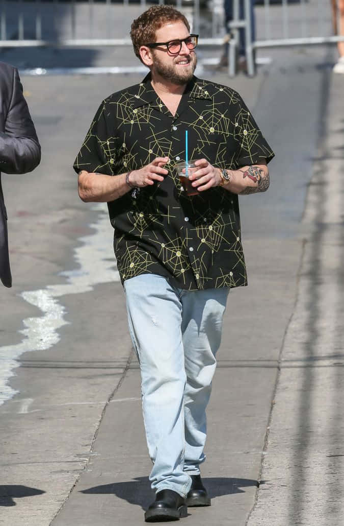 Actor Jonah Hill wears classic style at sunset Wallpaper