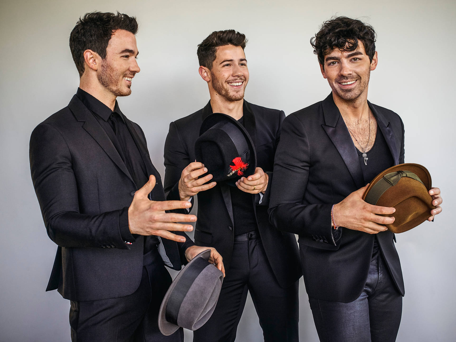 Jonas Brothers In Black Suits Wallpaper