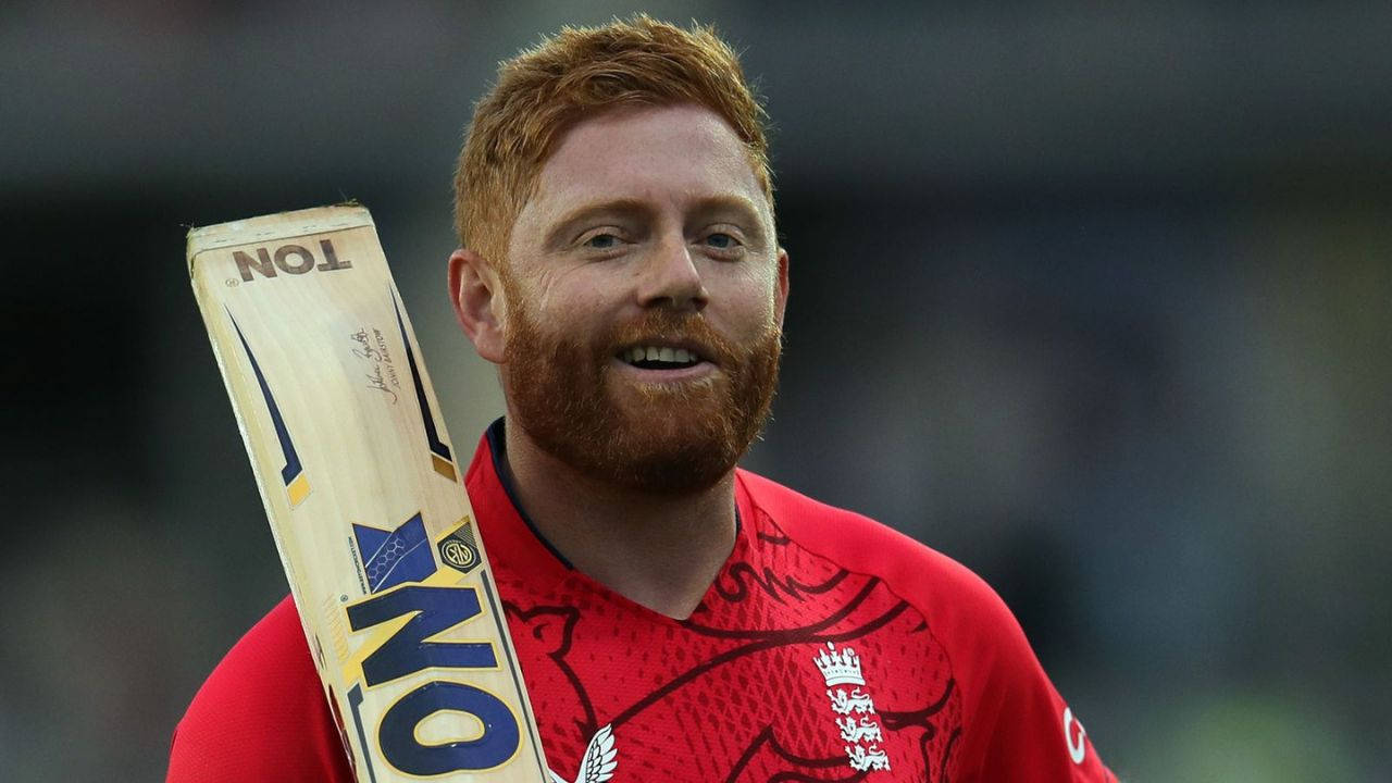 Caption: Jonny Bairstow striking a pose with his cricket bat Wallpaper