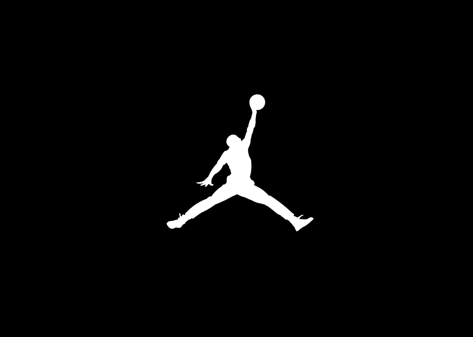 A White Jordan Logo On A Black Background