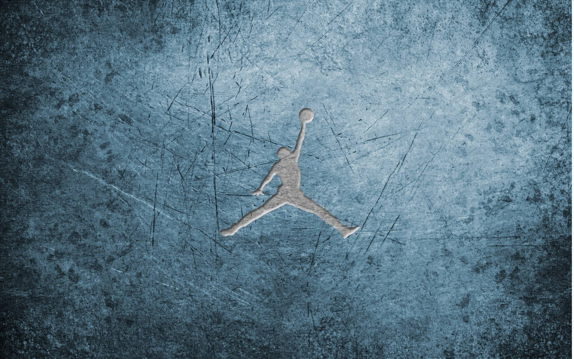 Jordan Logo On Scratched Surface Wallpaper