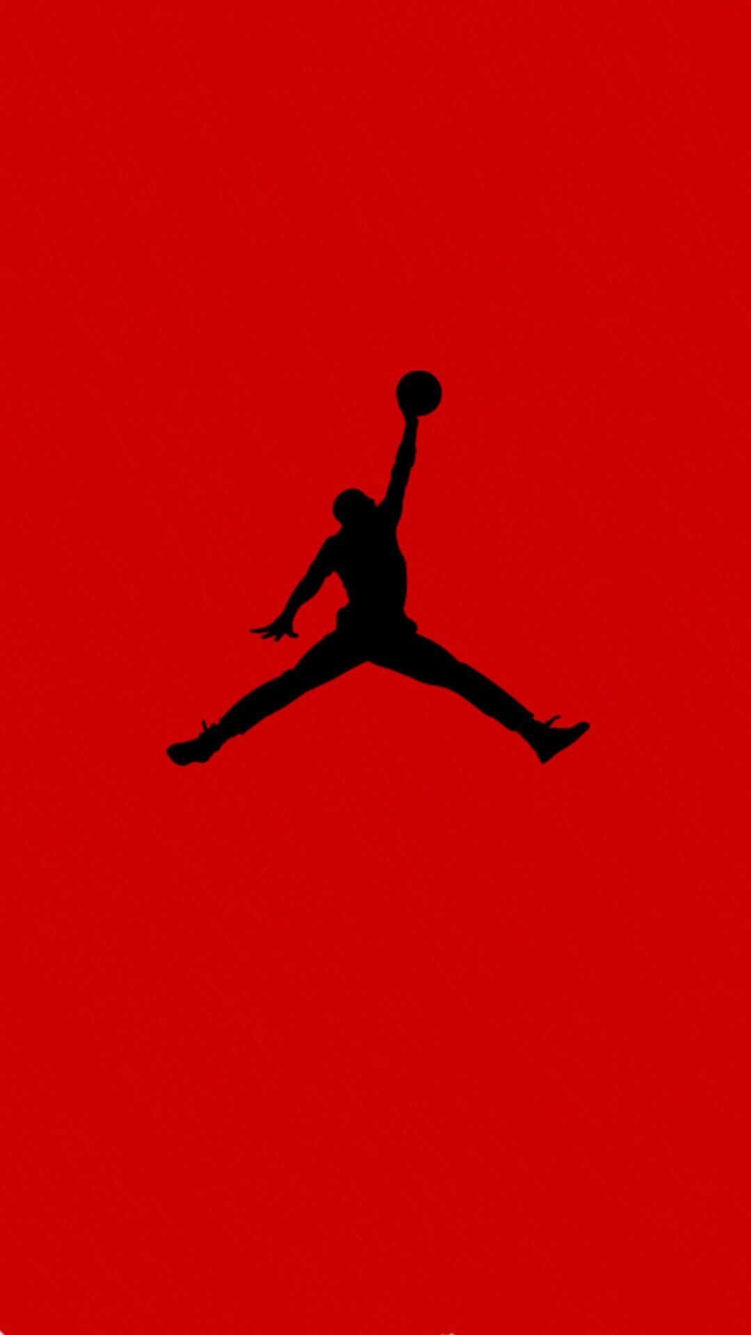 The iconic Jordan Logo stands out against a modern smartphone. Wallpaper