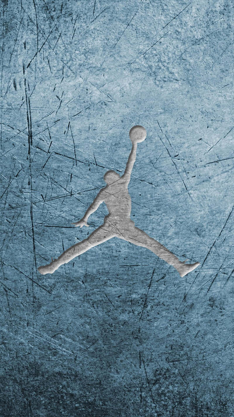 A Jordan Logo On A Blue Background Wallpaper