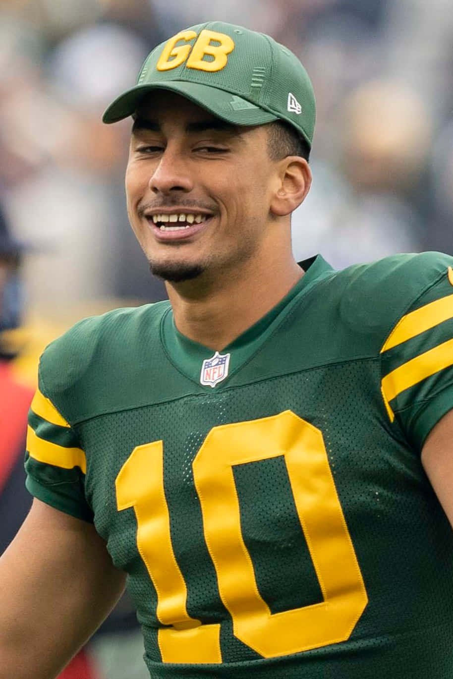 Jordan Love Green Bay Packers Smiling Wallpaper