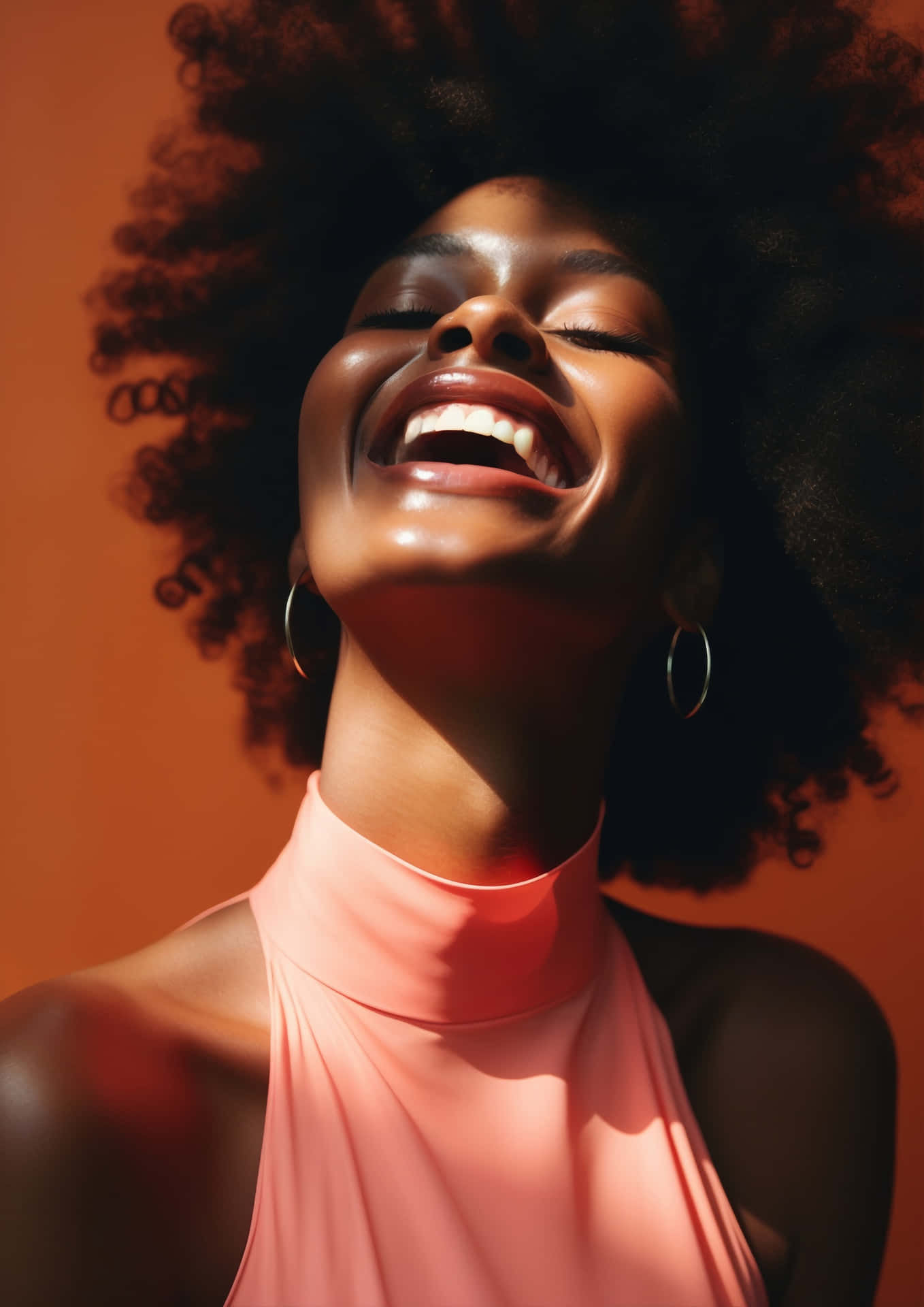 Joyful Afro Woman Laughing Wallpaper
