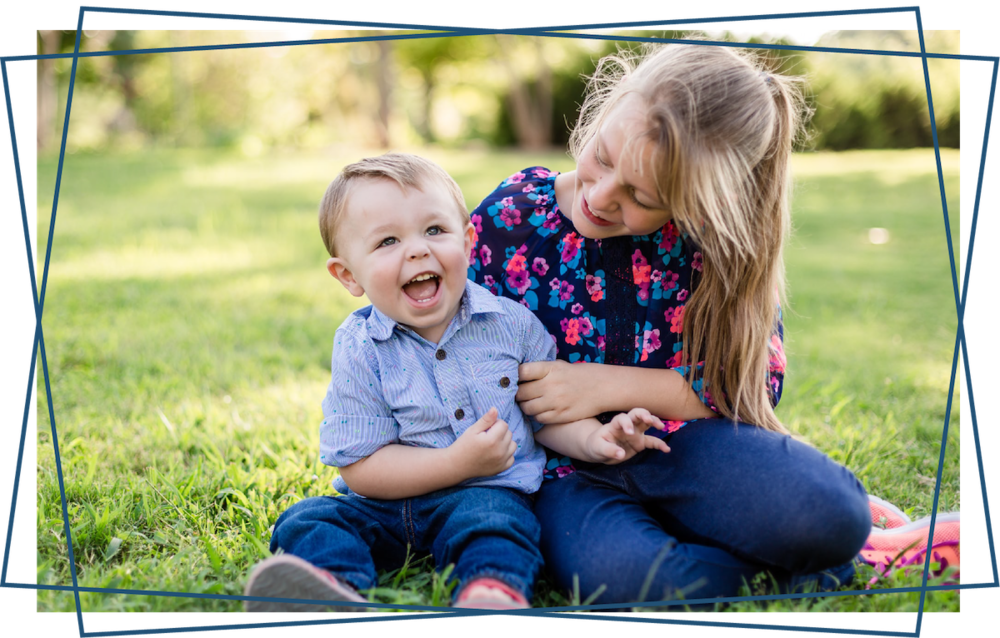 Joyful Siblings Playing Outdoors PNG