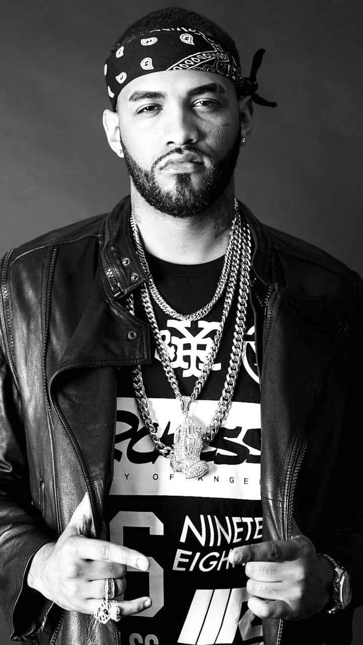 Joyner Lucas gracing the stage in his signature outfit. Wallpaper