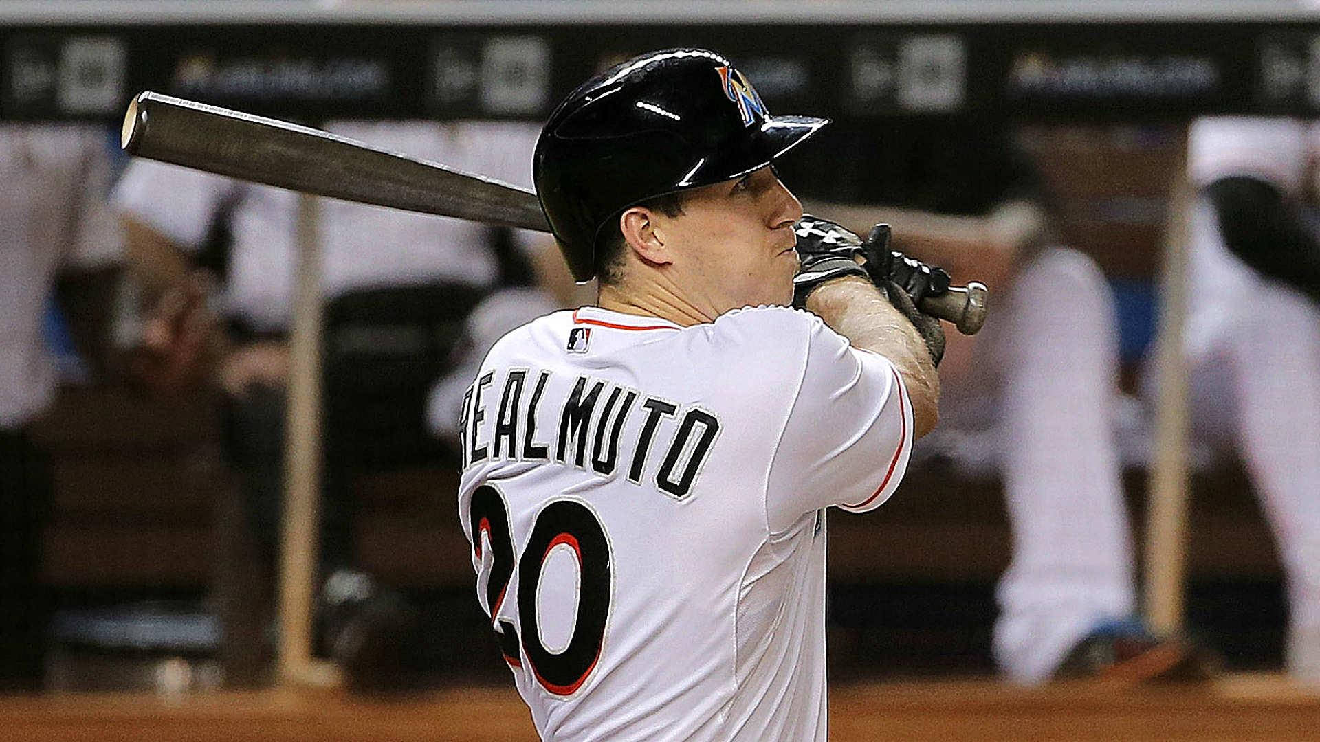 Jtrealmuto Anticipating The Ball - Jt Realmuto Förväntar Sig Bollen (on A Computer Or Mobile Wallpaper Featuring A Photo Of Jt Realmuto In Action) Wallpaper