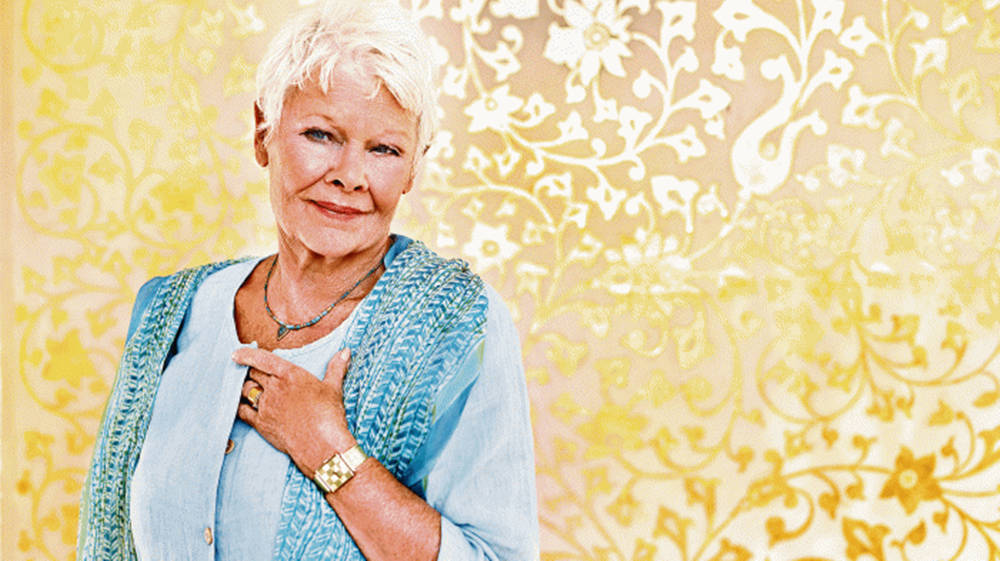 Judy Dench In Flowery Wall Wallpaper