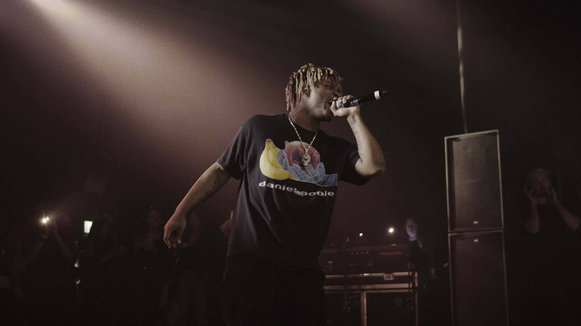 Experience the best of Juice Wrld at his electrifying concerts Wallpaper