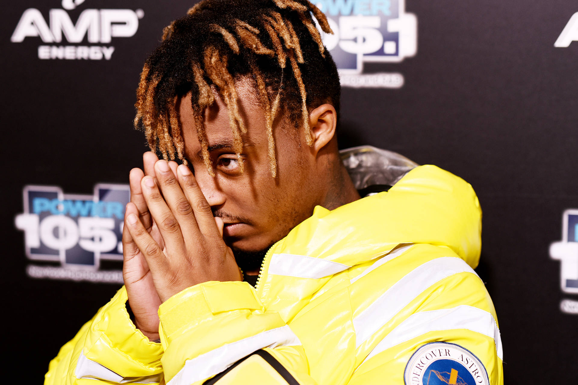 Download Juice Wrld Yellow Jacket Pose Wallpaper | Wallpapers.com