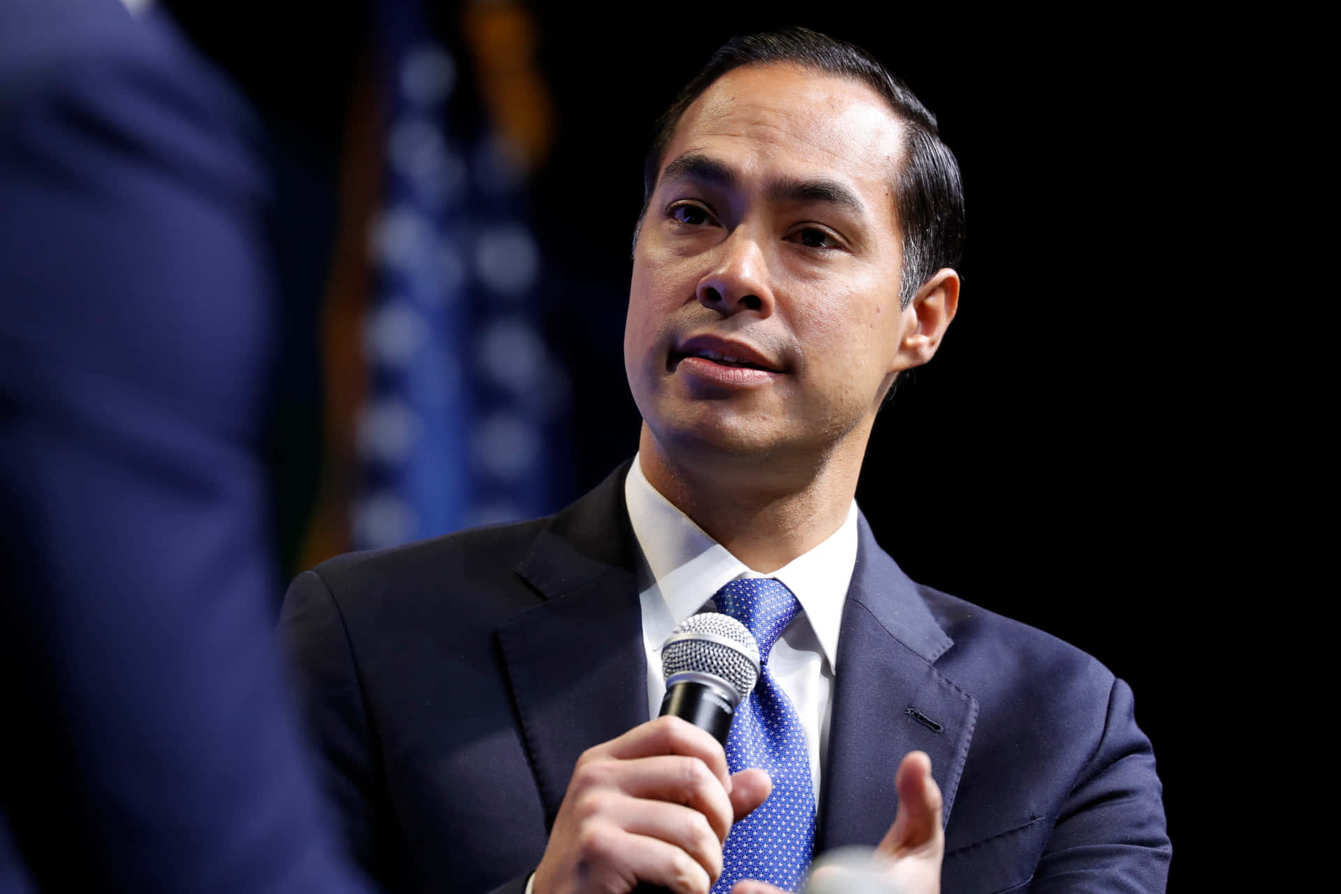 Julian Castro Holding Microphone Close-up Wallpaper