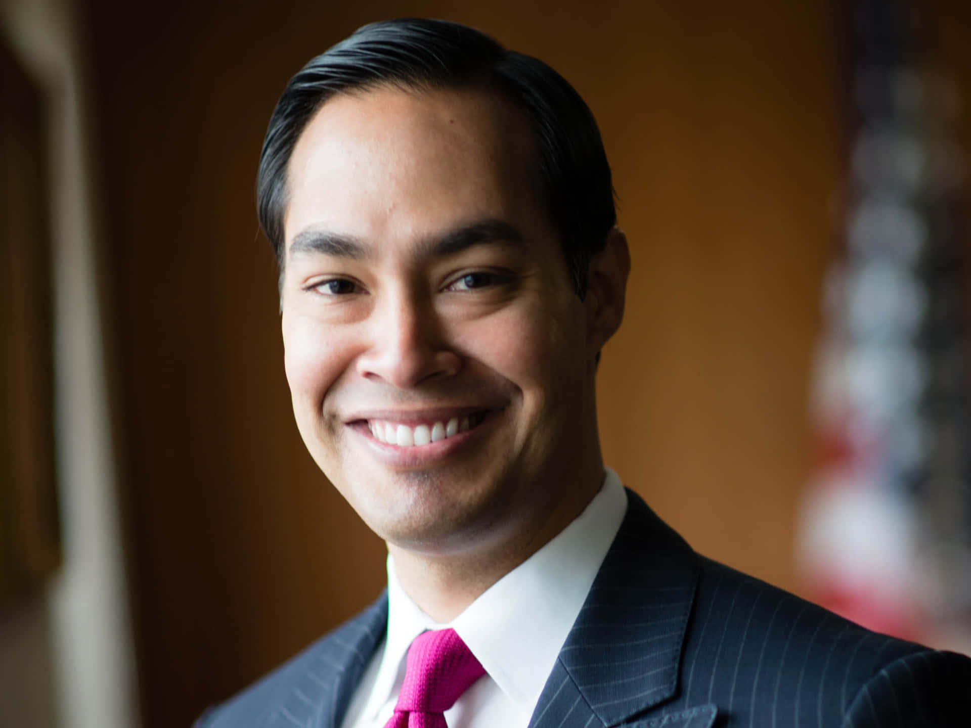 Julian Castro Smiling During an Event Wallpaper