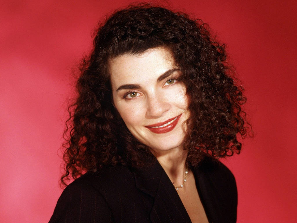 Julianna Margulies In Her Fine Curly Hair Wallpaper