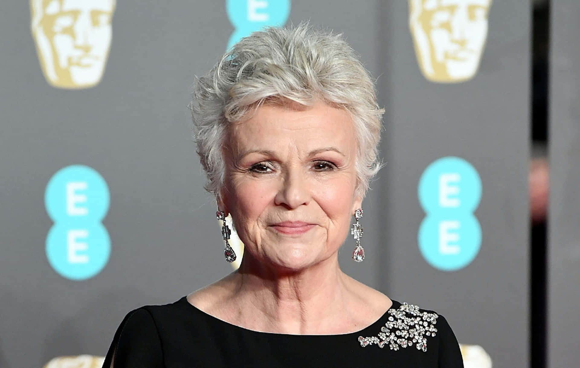 Julie Walters In An Expressive Stage Performance Wallpaper