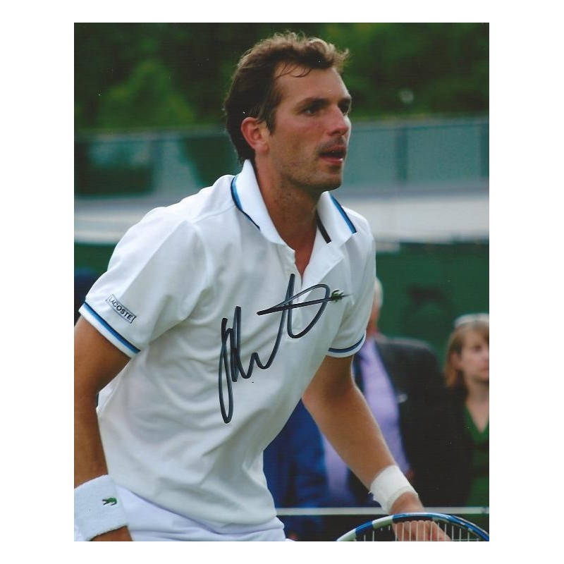 Professional Tennis Player Julien Benneteau in Action Wallpaper