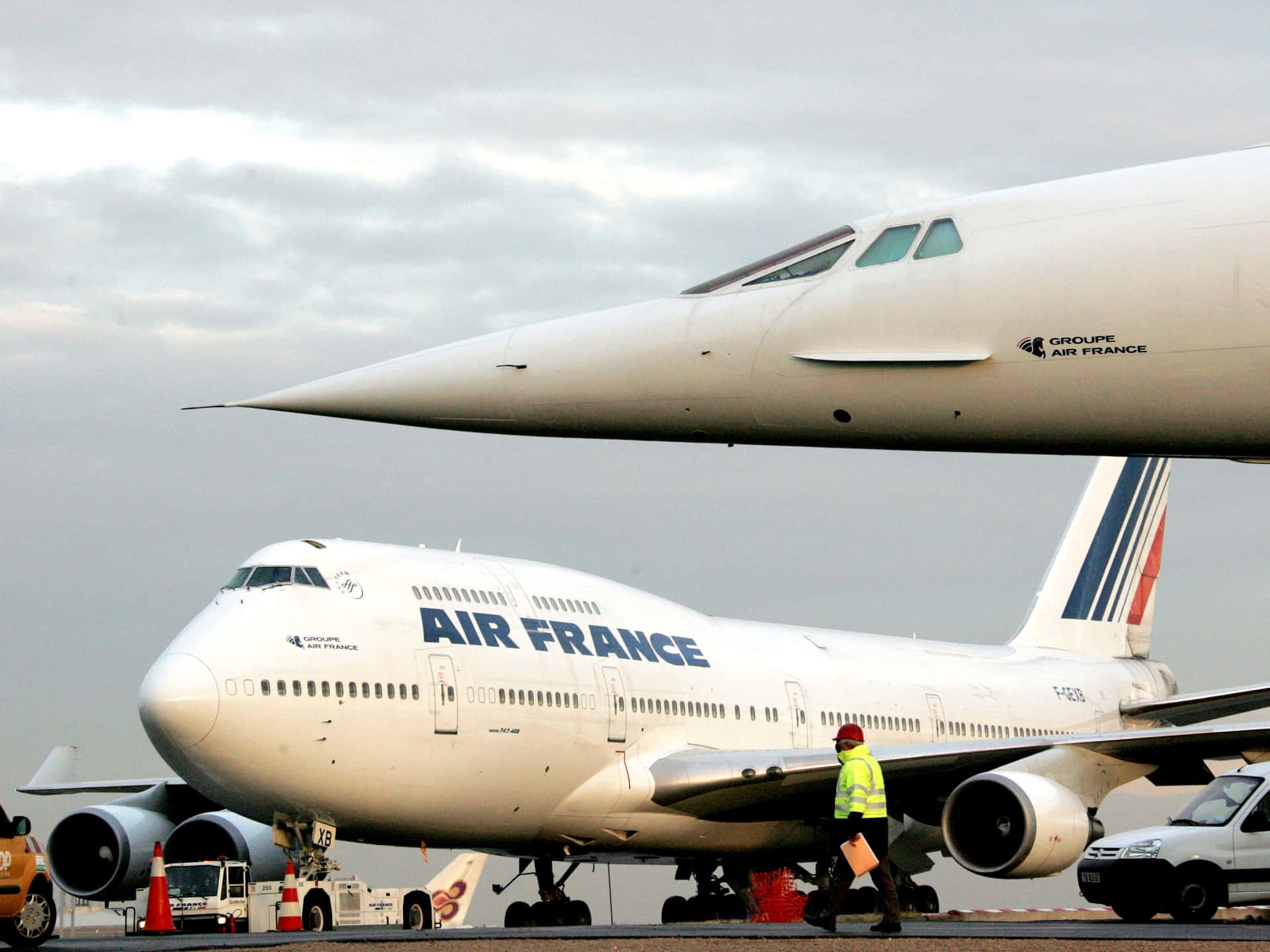 A stunning lineup of jumbo jets on an airport runway