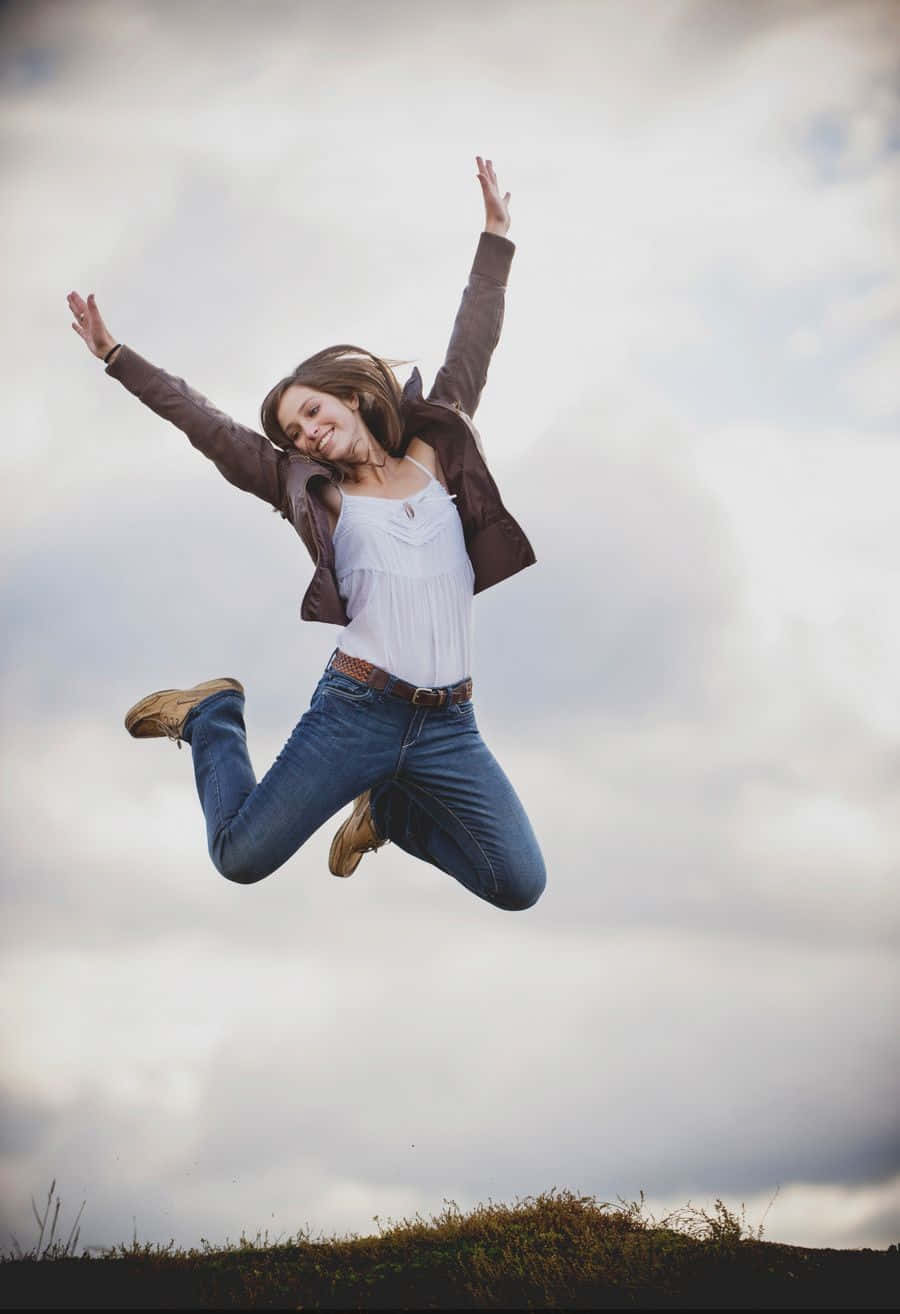 A Woman Jumping In The Air