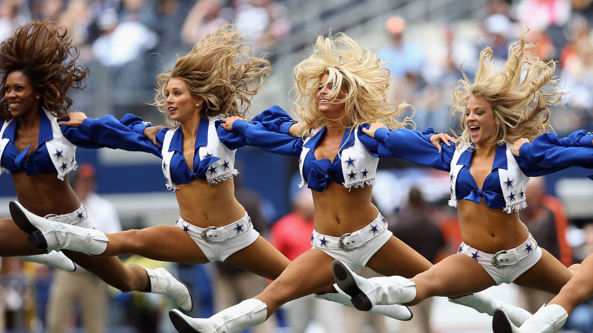 Jumping Cheerleaders For The Awesome Dallas Cowboys Wallpaper