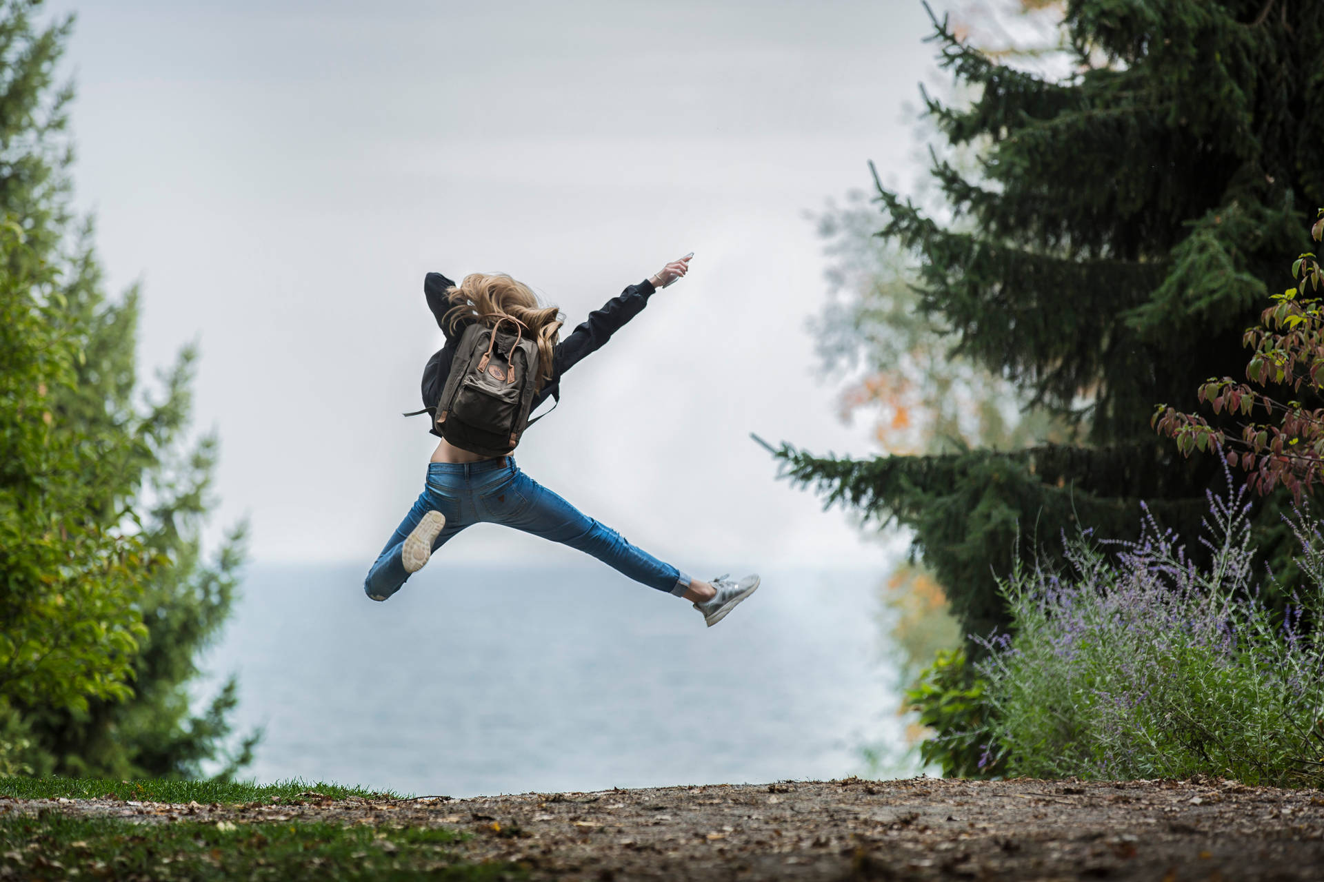 Jumping Girl Excited Wallpaper Wallpaper
