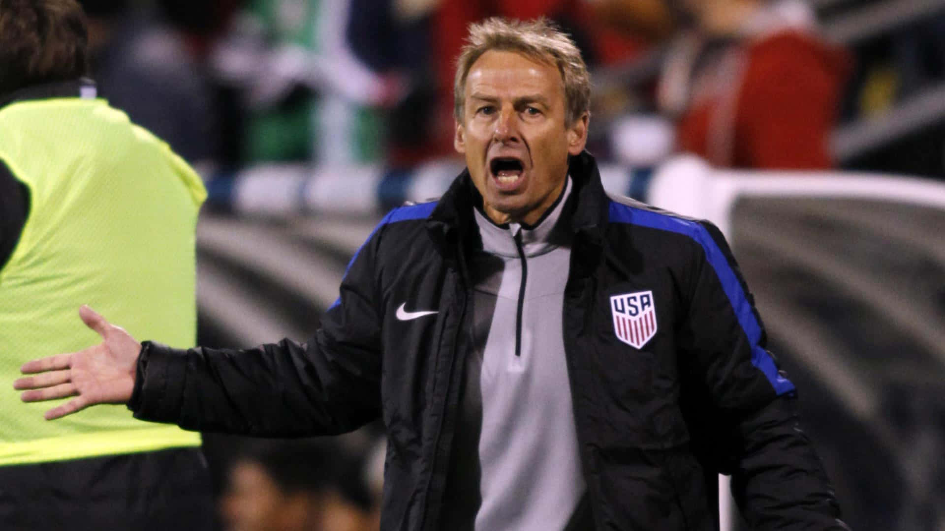 Jurgen Klinsmann råber og udstrækker arme Wallpaper