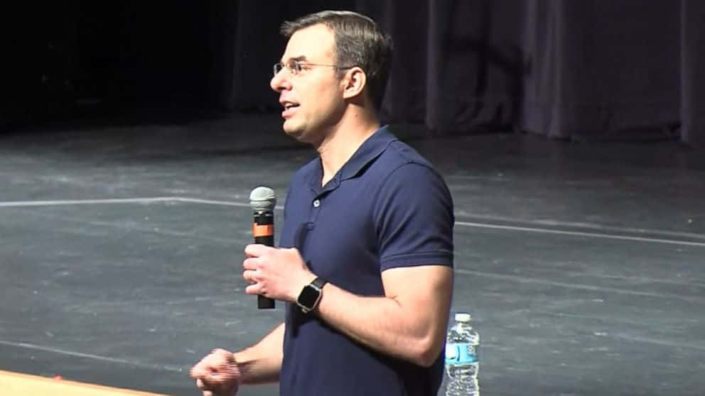 Justin Amash Giving A Speech At A National Event Wallpaper