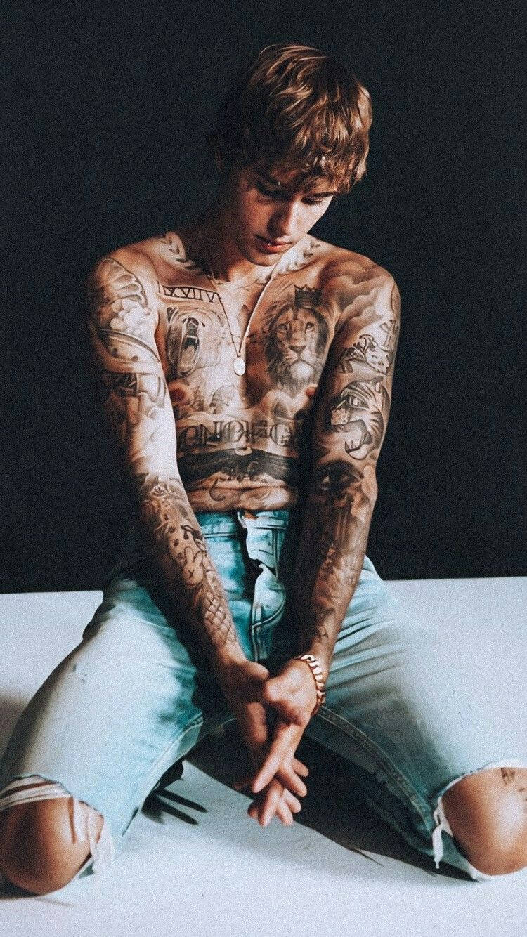 Justin Bieber Shows Off His Many Tattoos Wallpaper