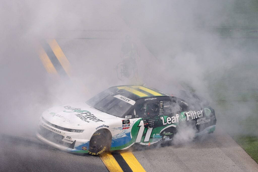 Justin Haley Car Covered In Smoke Wallpaper