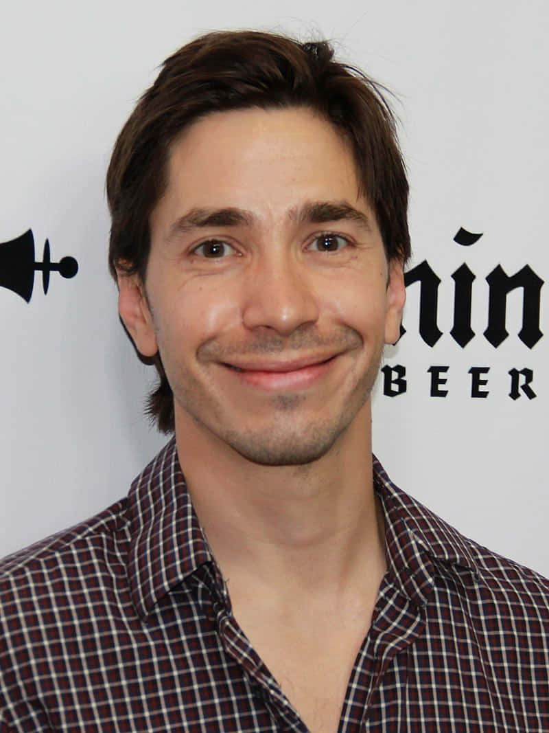 Justin Long posing for a candid portrait Wallpaper
