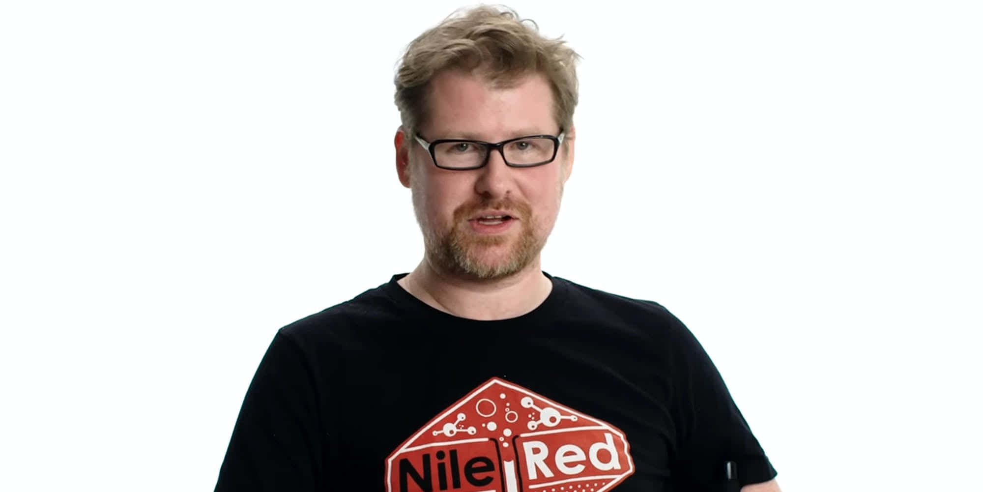 Justin Roiland, Co-creator of Rick and Morty, in a dynamic pose Wallpaper