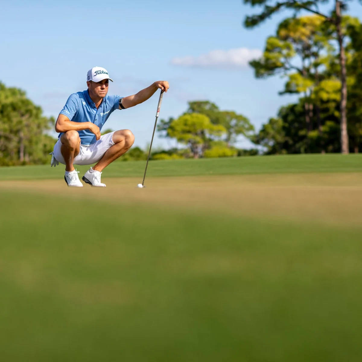 Justin Thomas At A Golf Course Wallpaper