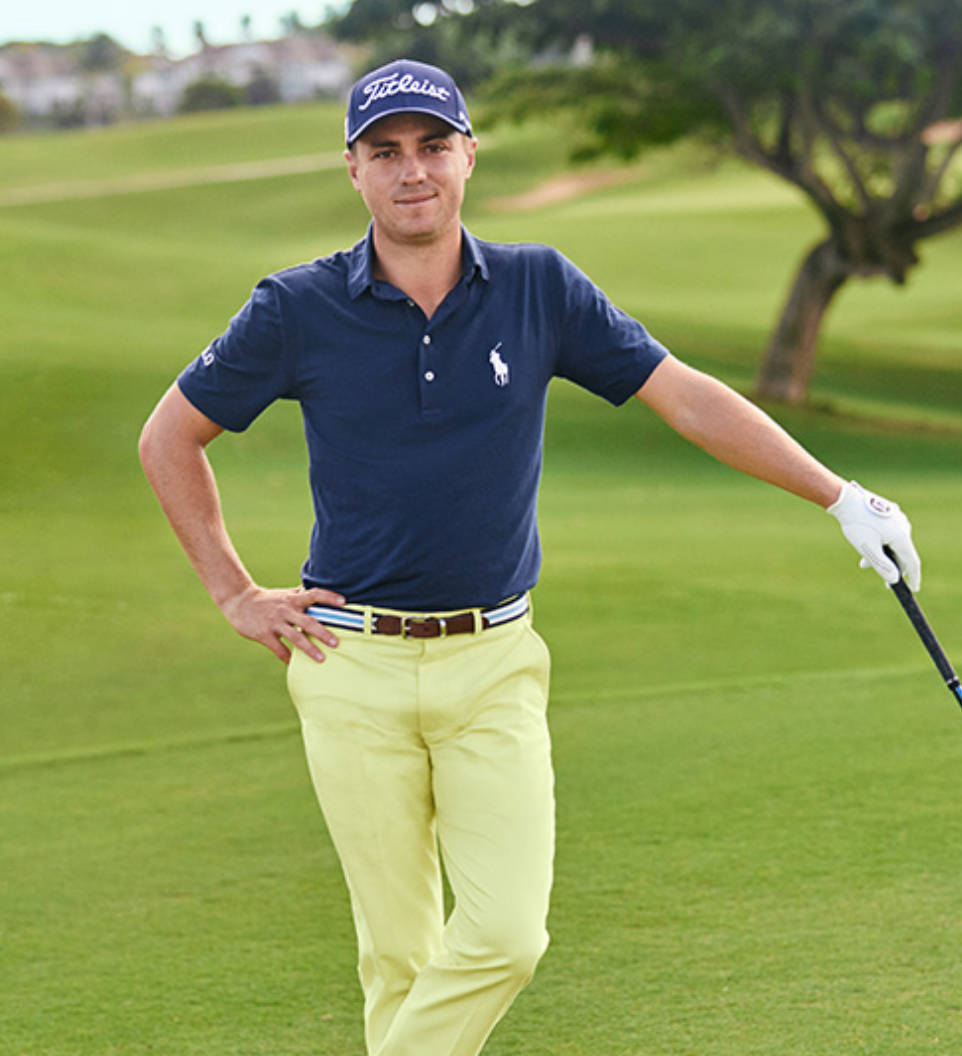 Justin Thomas In Yellow Trousers Wallpaper