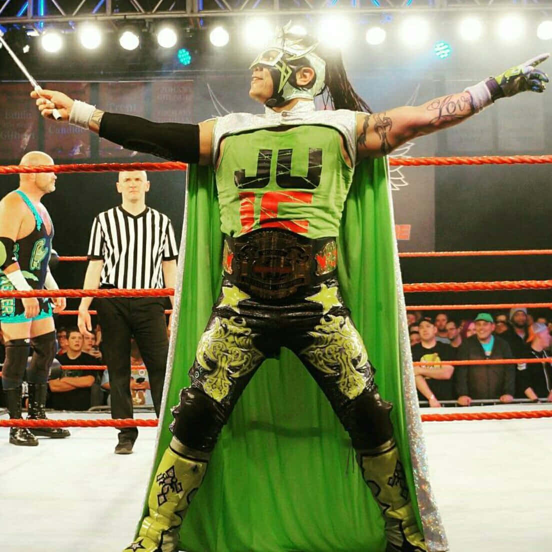 Juventud Guerrera In Green Wearing WCW Belt Wallpaper