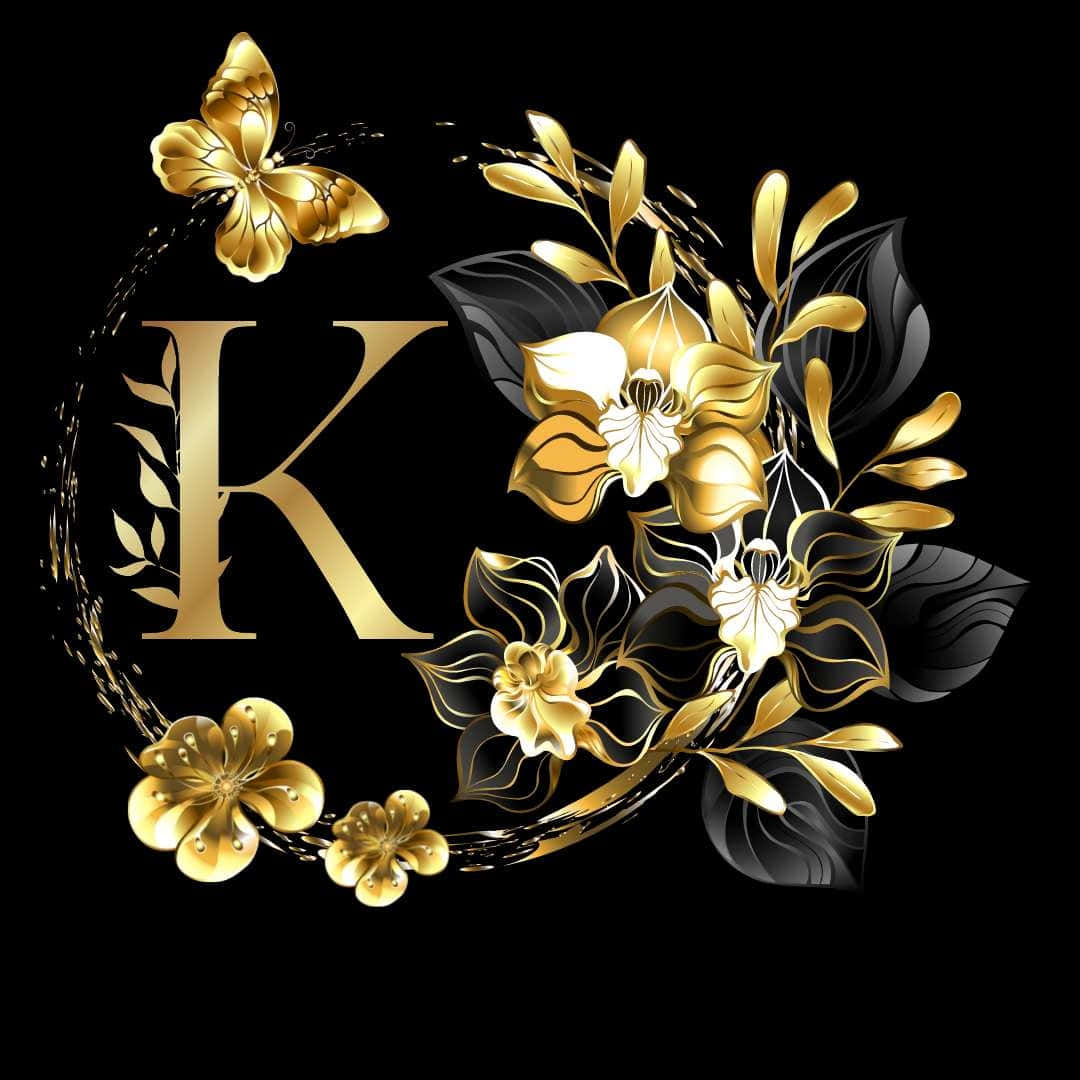 A Gold And Black Floral Design With The Letter K