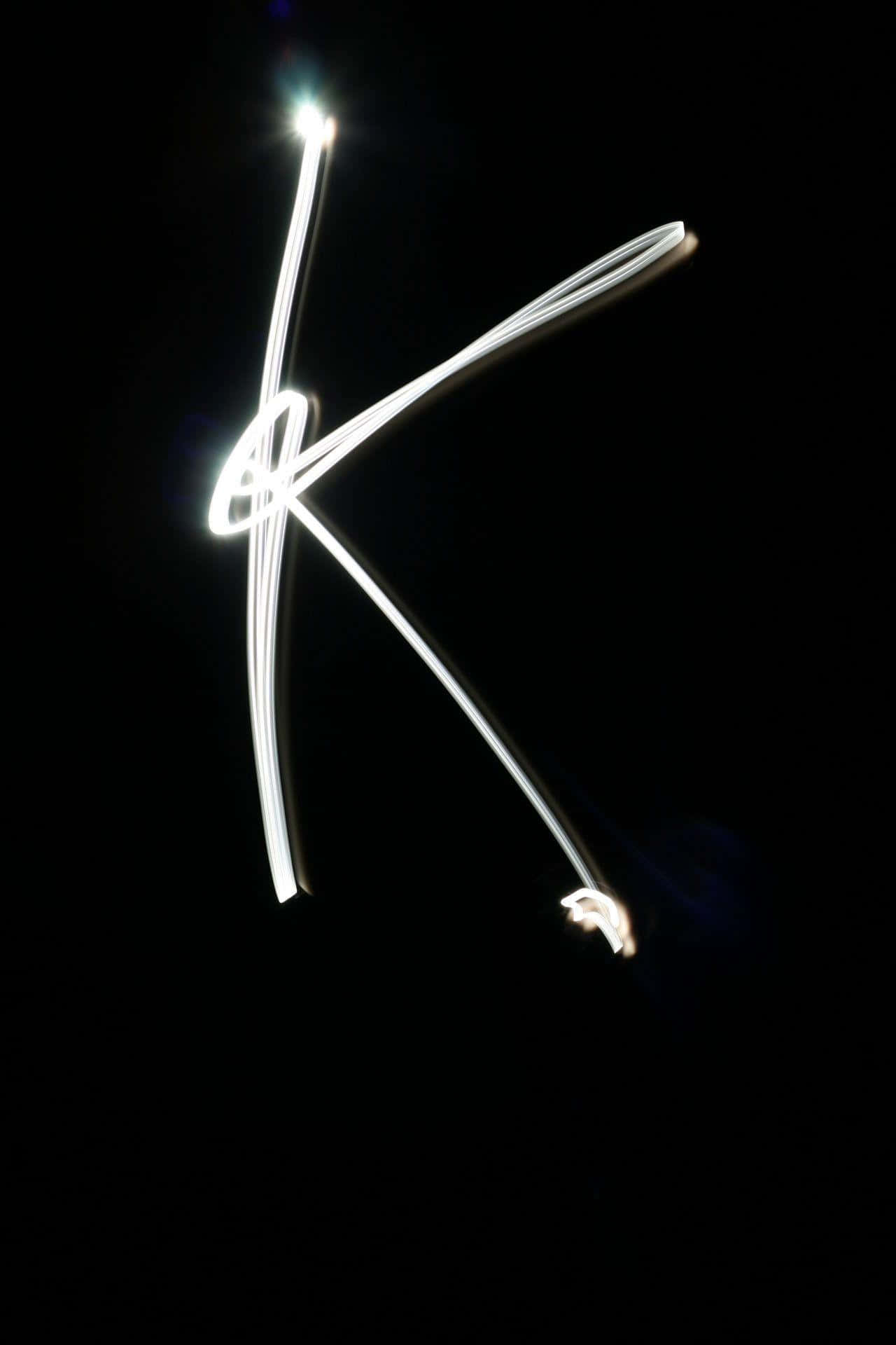 A Light Painting Of The Letter K