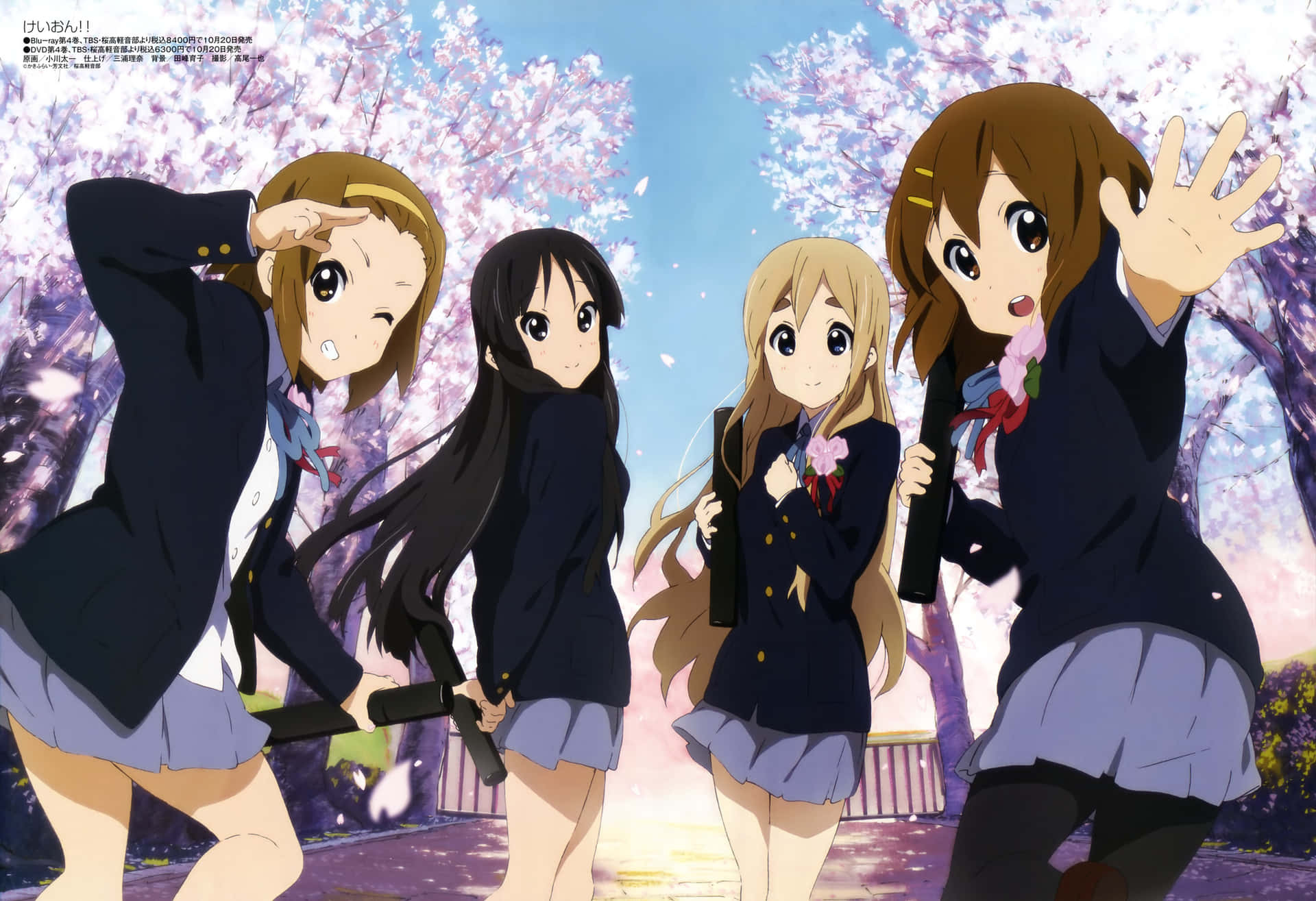 A Group Of Girls In School Uniforms Standing In Front Of A Tree
