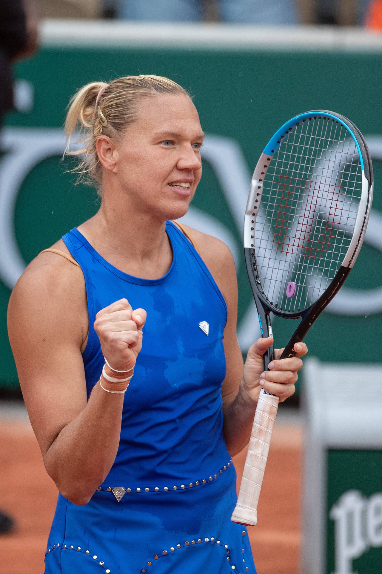 Exhilarating victory moment of Kaia Kanepi in a tennis match Wallpaper