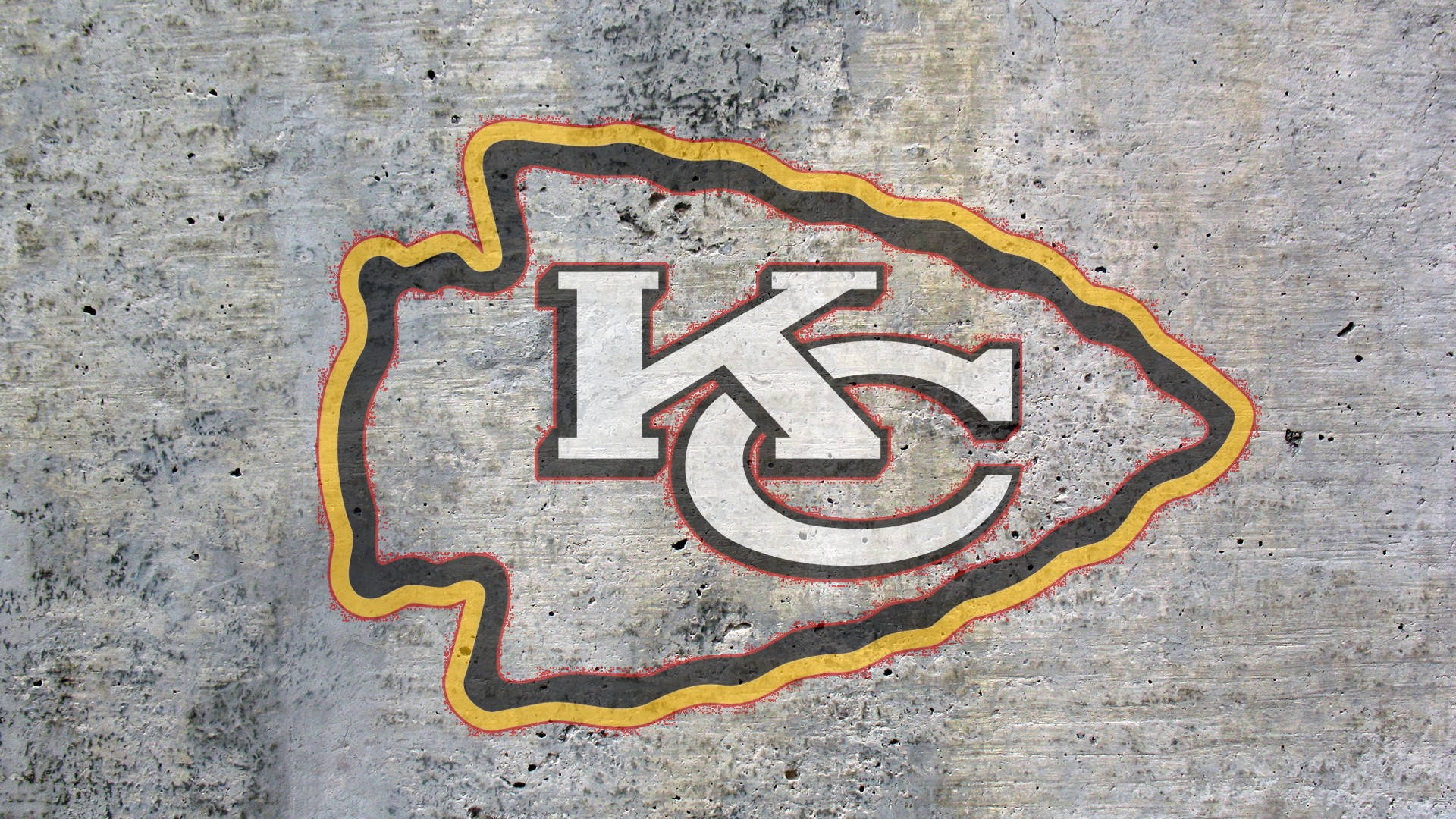 Kansascity Chiefs Logo Auf Beton. Wallpaper